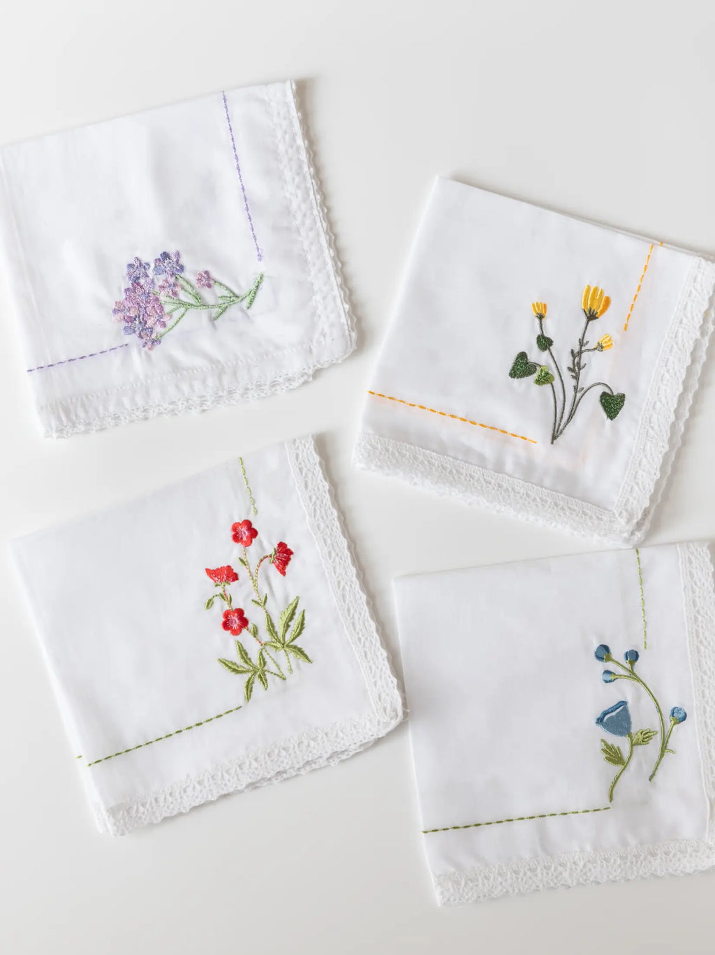 Bouquet Corners handkerchief with floral corner embroidery and lace edging