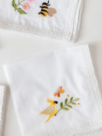 Garden Whimsy handkerchief with embroidered bee motif and lace edging