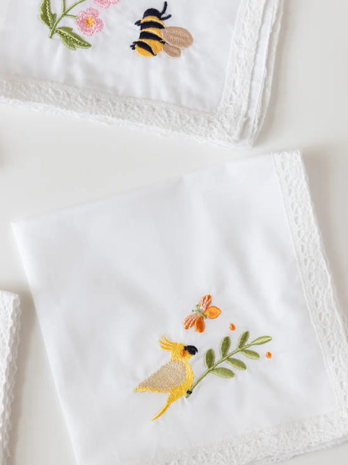 Garden Whimsy handkerchief with embroidered bee motif and lace edging