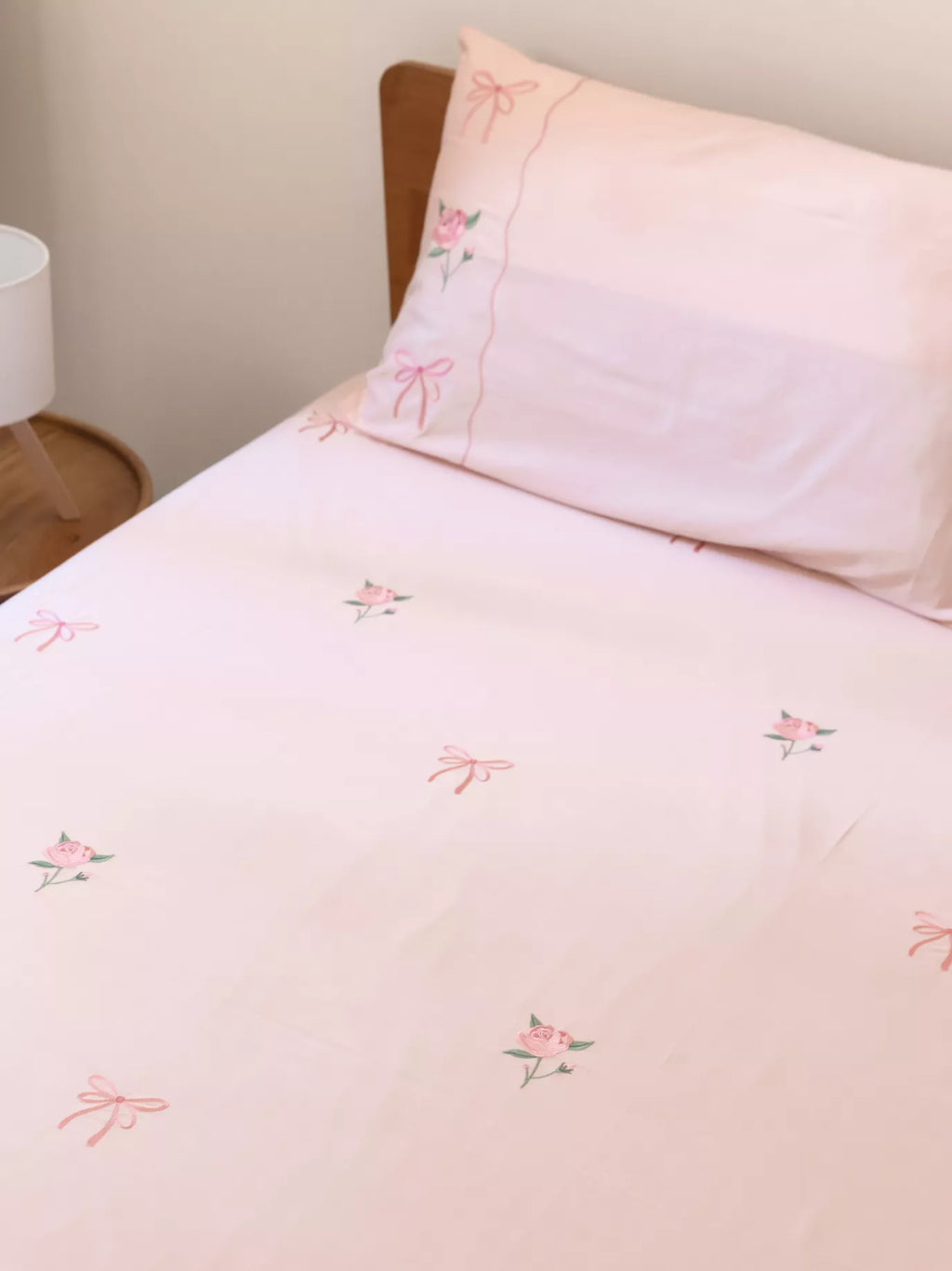 Pink Bedding set with floral and bows embroidery detailing