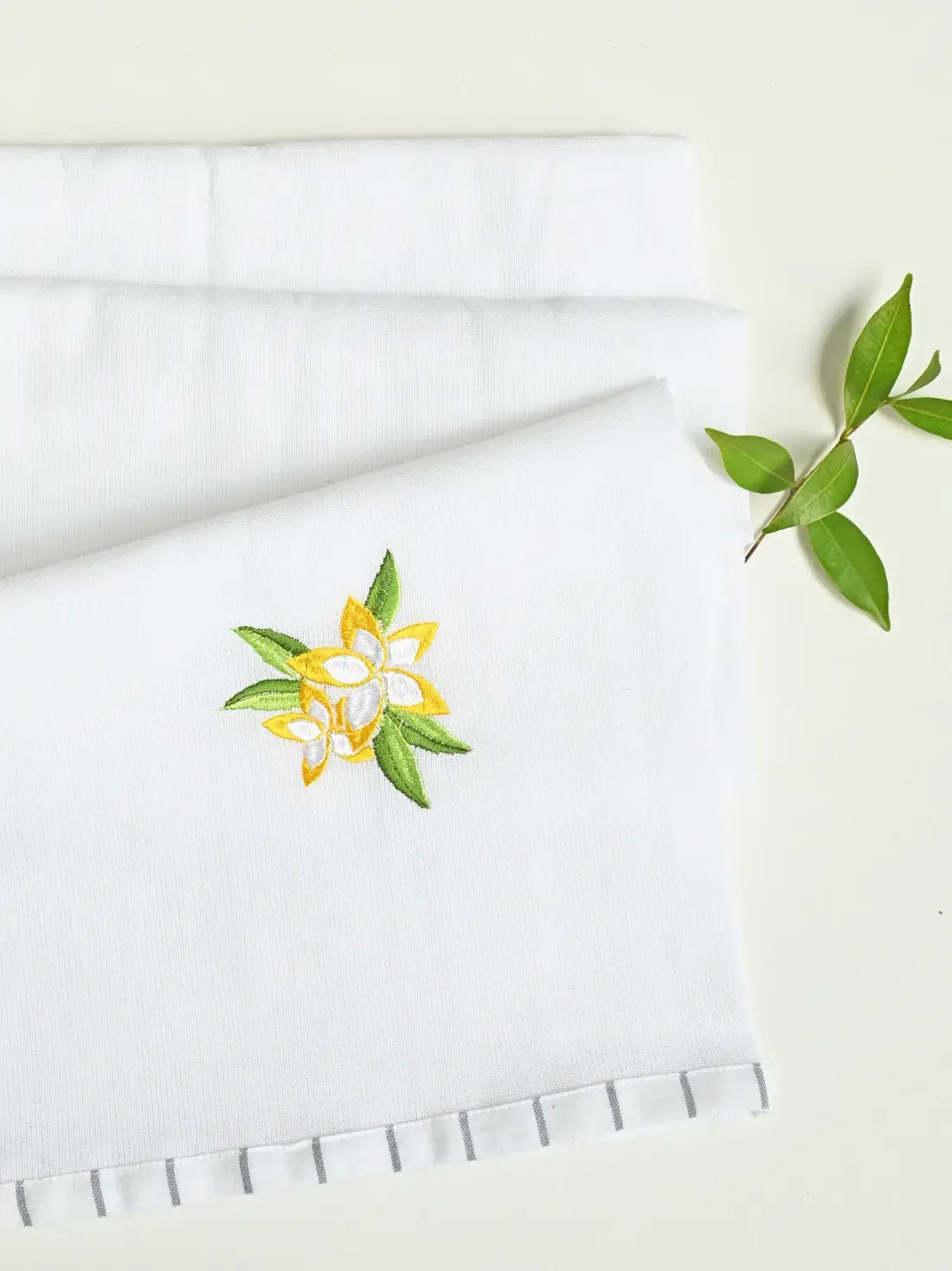 White Kerala Thorthu towel with yellow flower embroidery and grey striped border